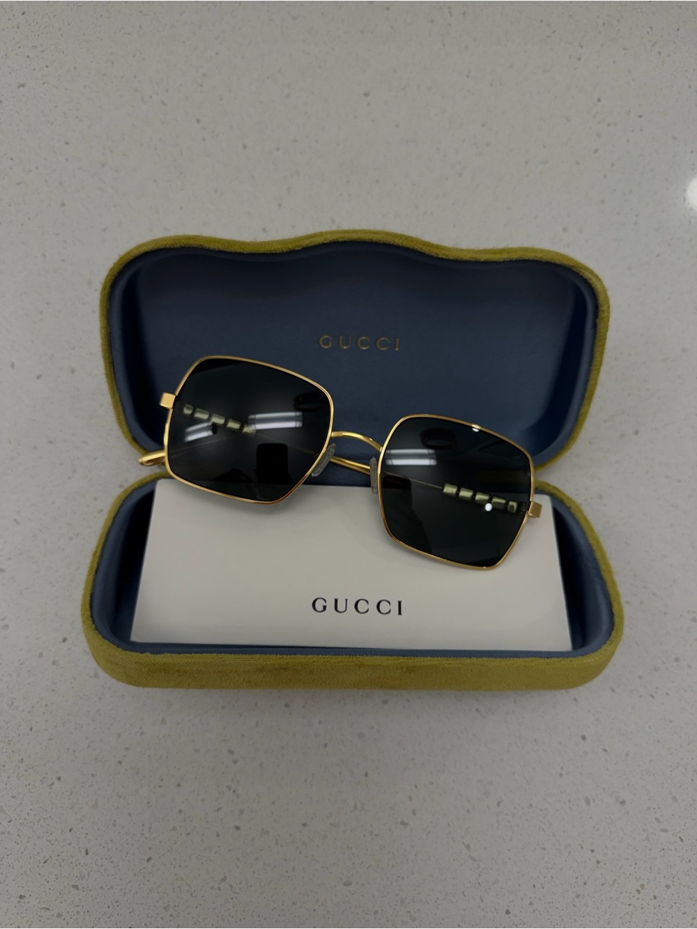 Gucci Gold Frame Sunglasses with Polarized Lenses